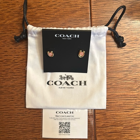 Coach Jewelry - COACH GOLD & PINK HORSESHOE EARRINGS. Comes with dustbag and authenticity card.